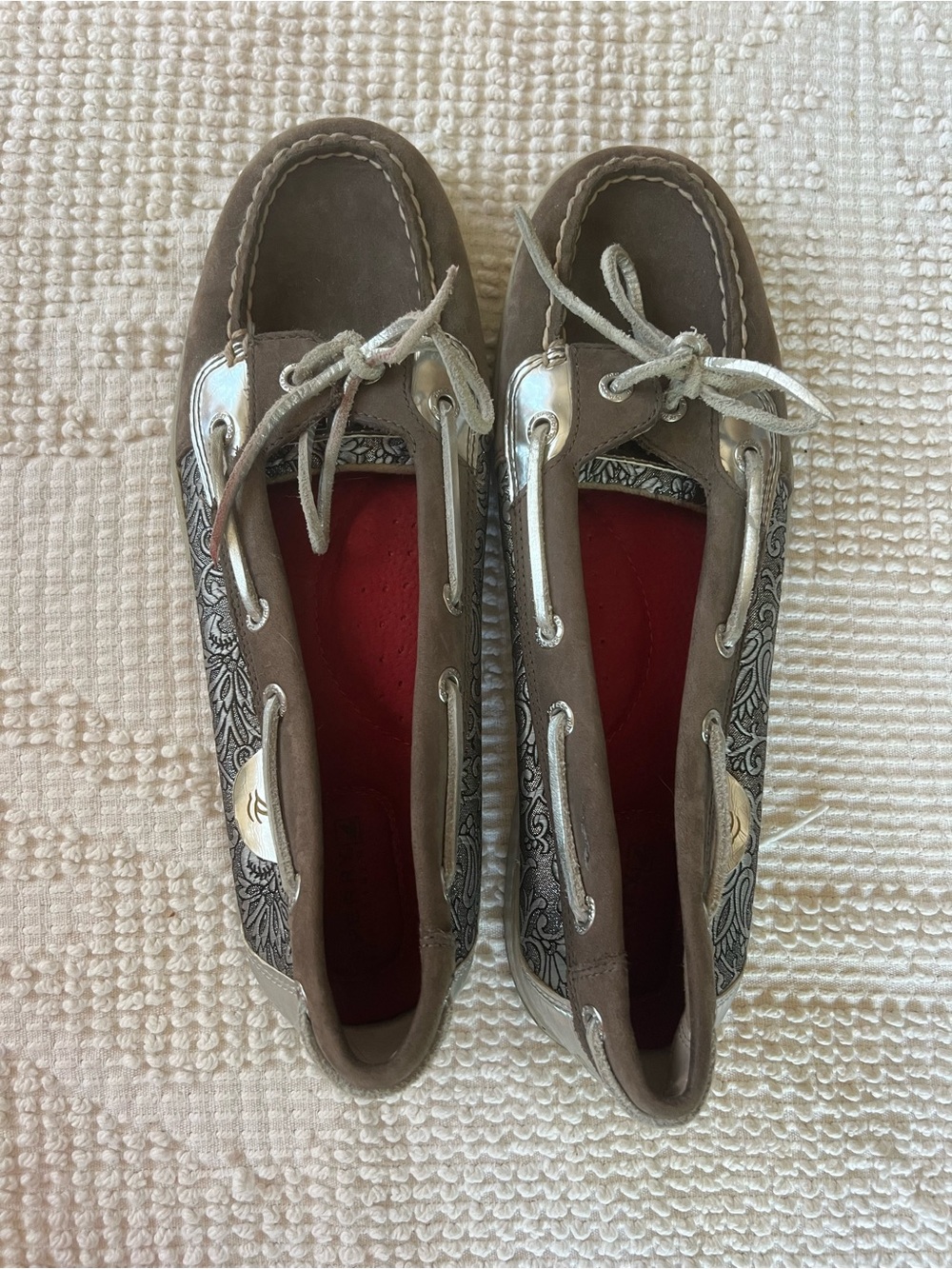 Sperry Women’s gray and silver Boat Shoes with Red Insole
